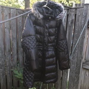 This is a Guess Coat and good quality.